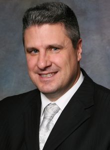 Headshot of High School Principal John Rickert