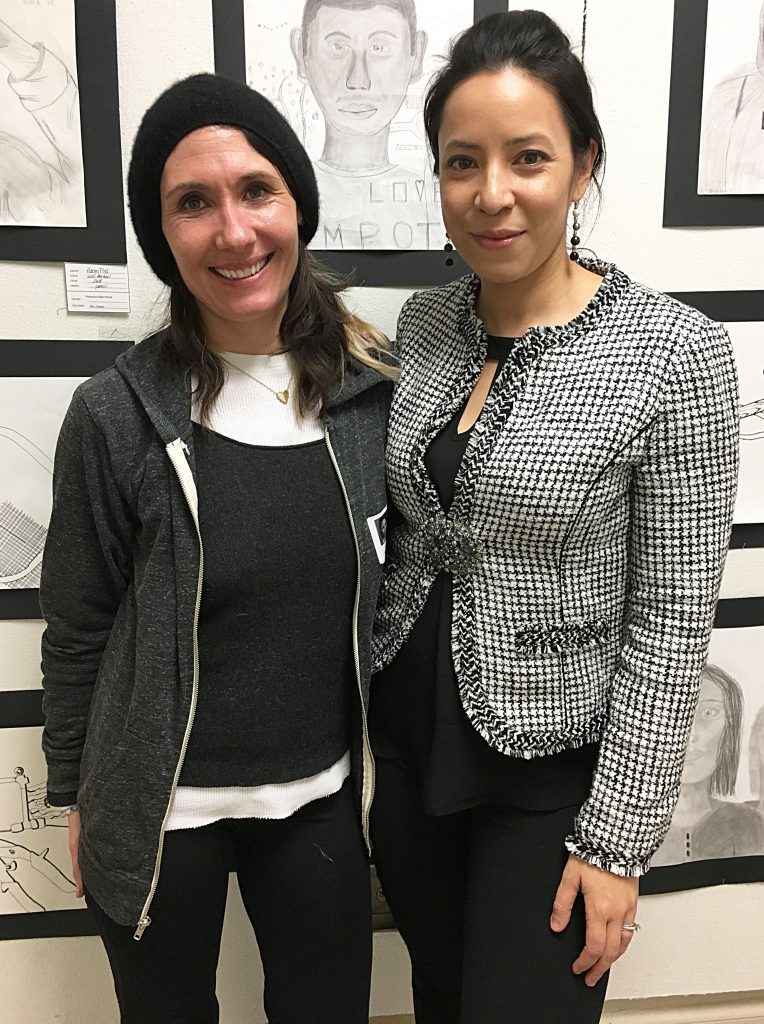 Athena Fliakos and Christina Roberts pictured in a school hallway