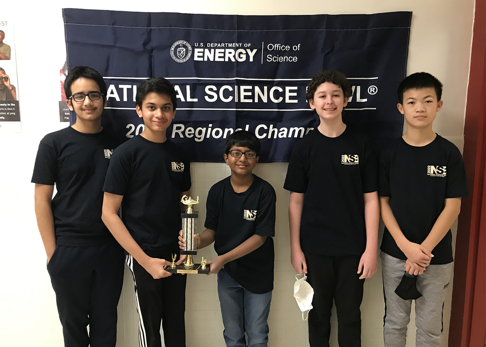 five students holding trophy from science bowl regional win