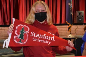 Heather Schmidt, Niskayuna High School senior, holding Stanford University pennant