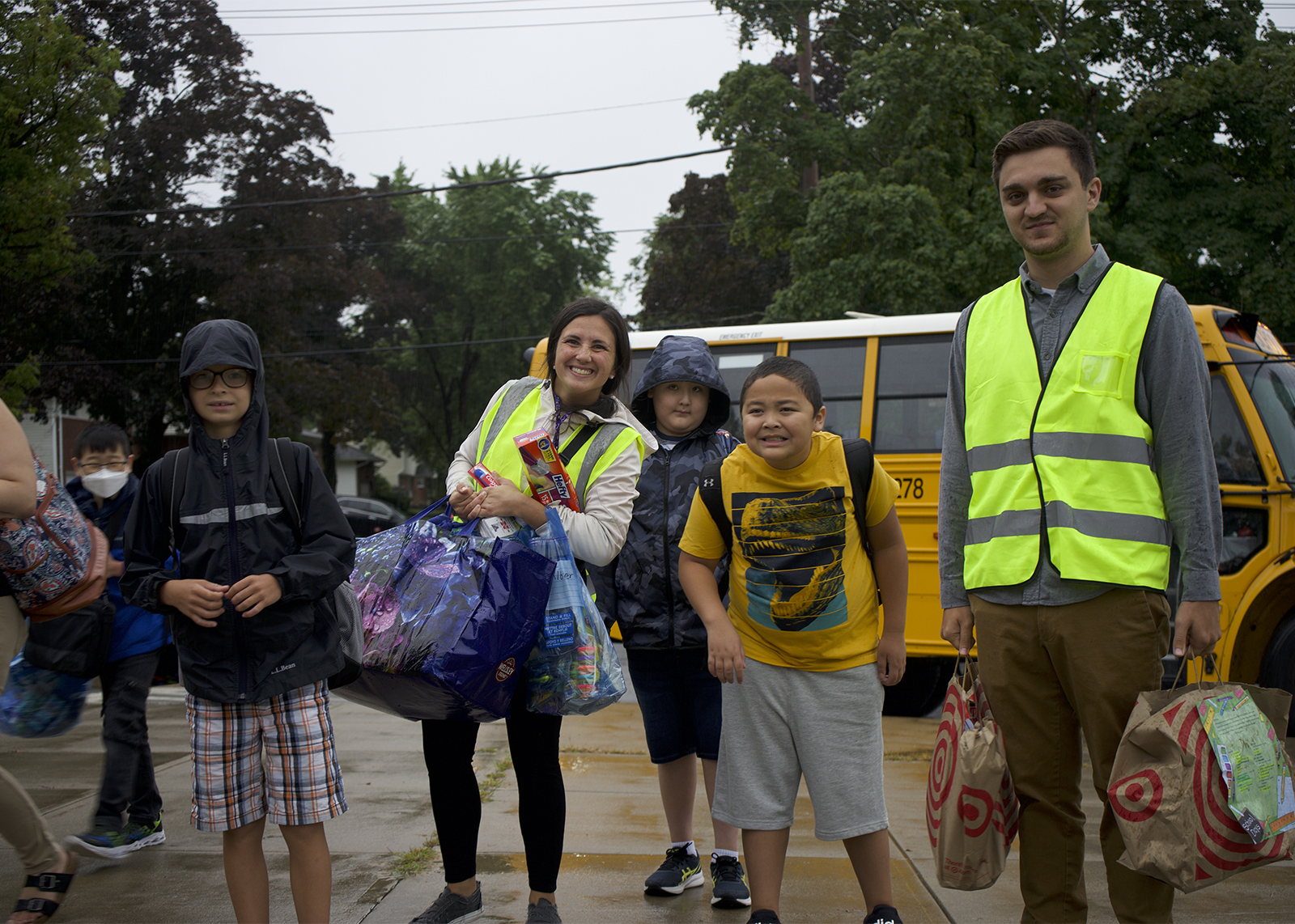 students and staff smile on first day