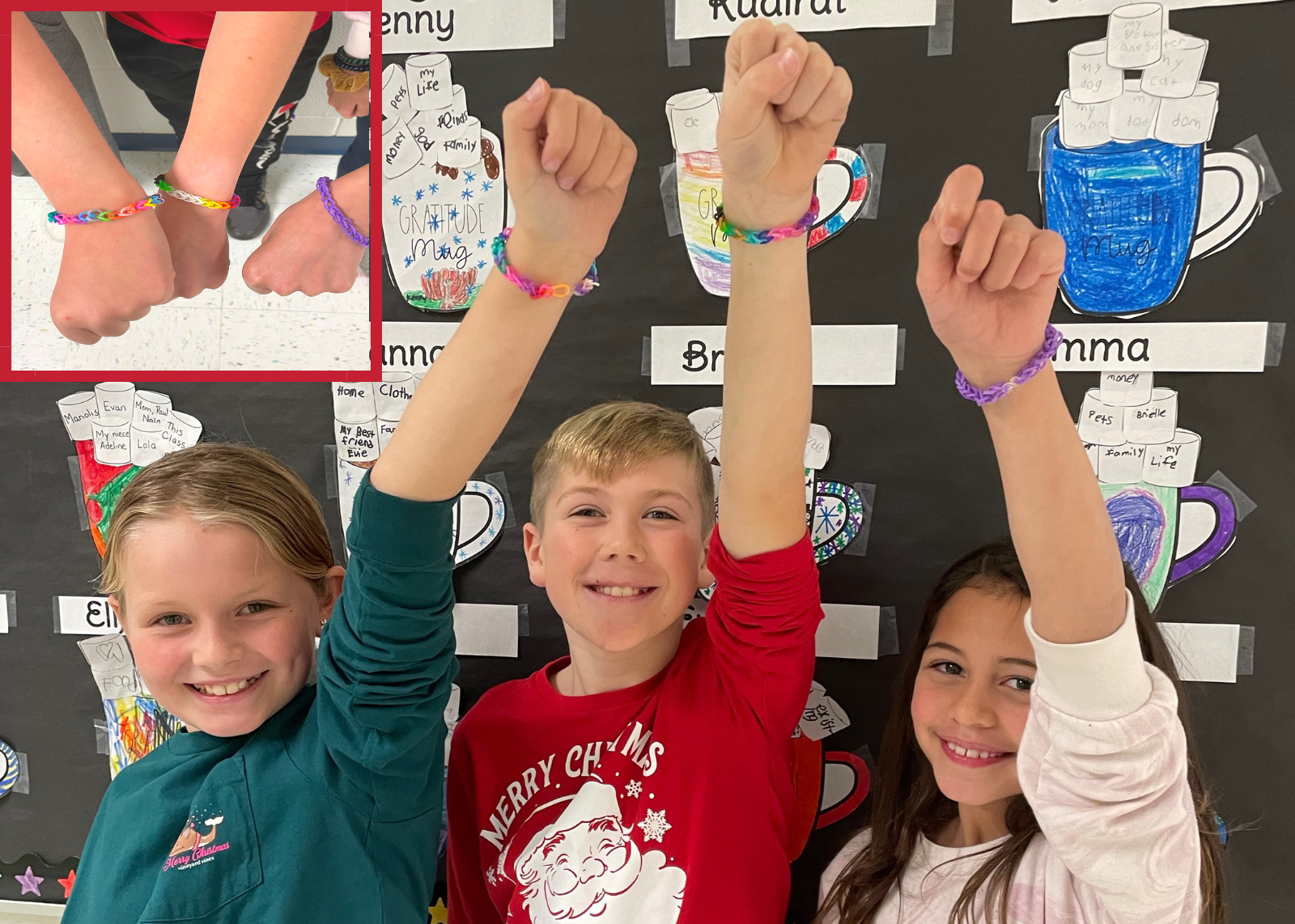 group of students smiling holding up arms to show off friendship bracelets