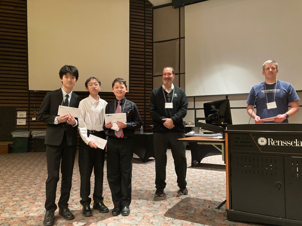 Jason Lian and Andrew Zhang and Brian Sun with their project
