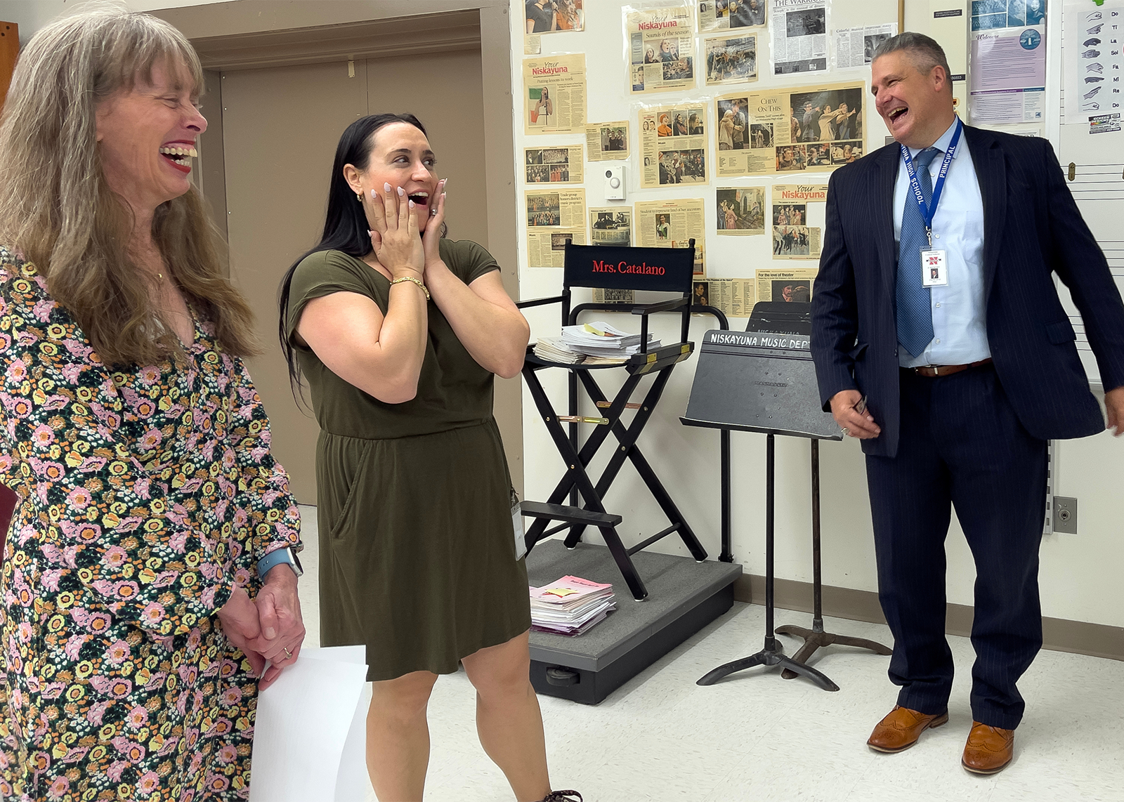 teacher surprised at receiving an award