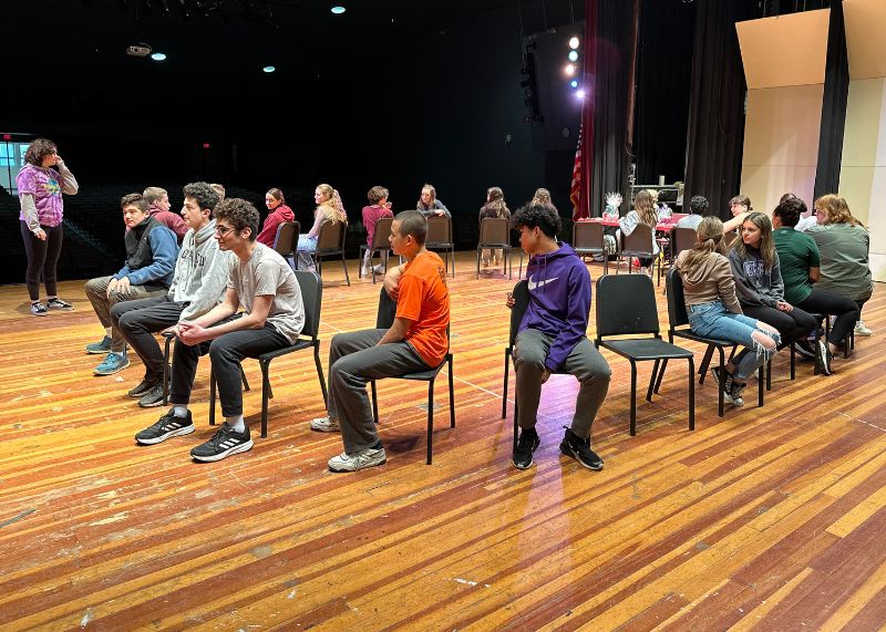 Students seated in a circle