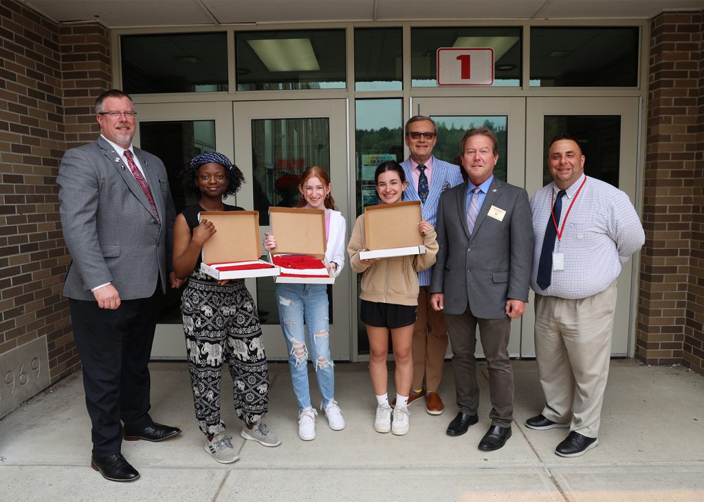 students getting awards from local elks with school administrators