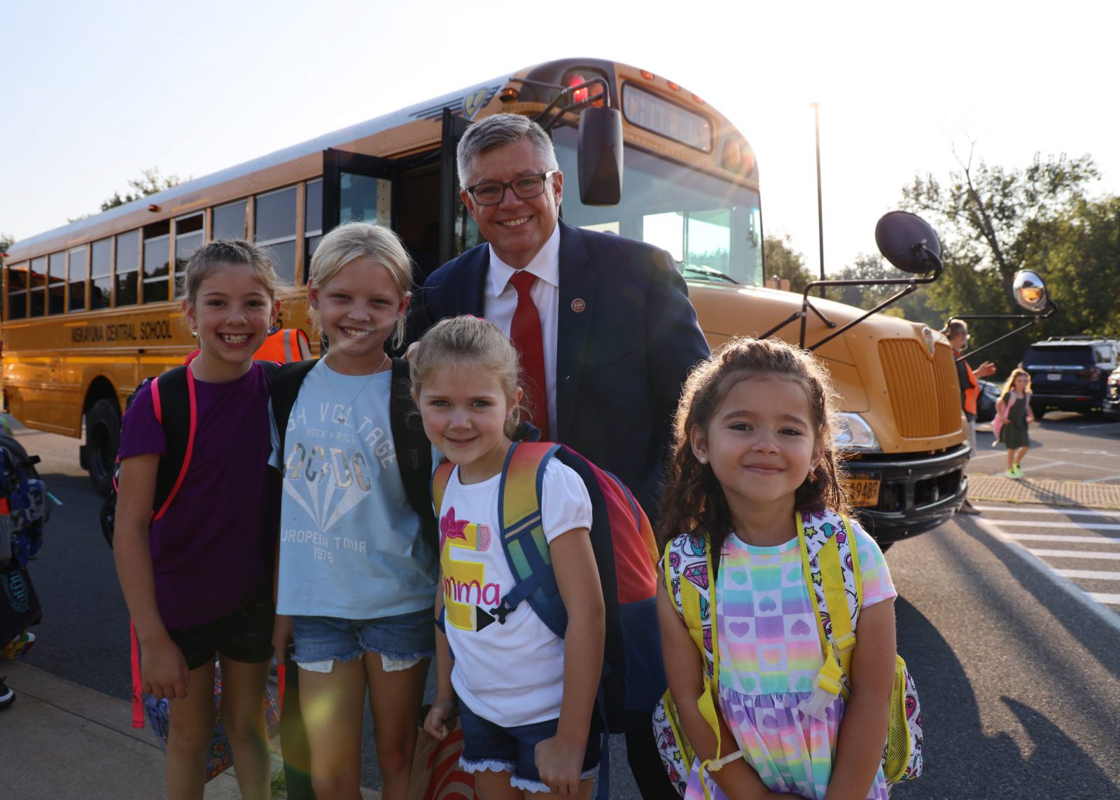 smiling students at Glencliff with superintendent