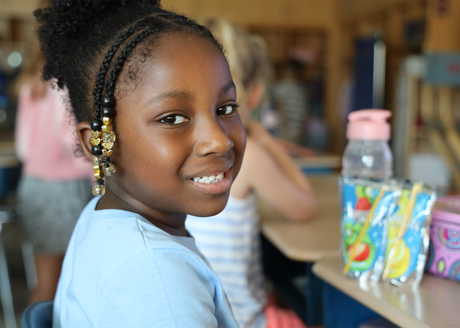 elementary student smiling