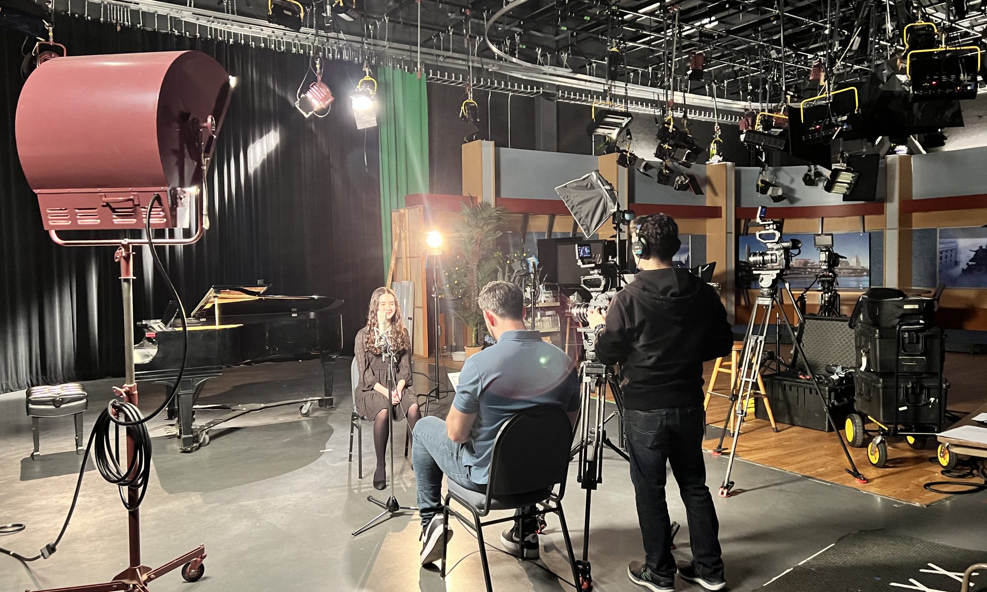 Student being interviewed in a TV studio