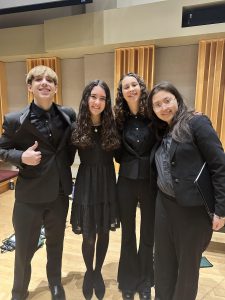 (Left to right) Aidan Page, Sophie Spindler, Sofia Trimarchi, and Lily Graham at NYSSMA All-State in Rochester in December 2023.
