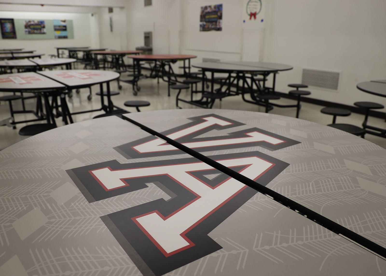 cafeteria tables with VA written on them