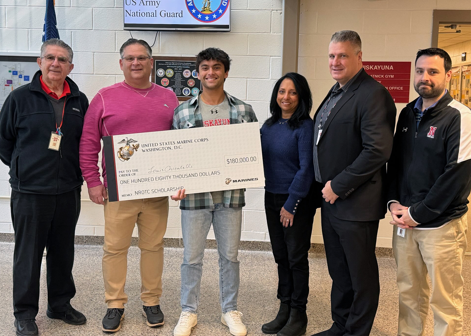 student received oversized check for scholarship