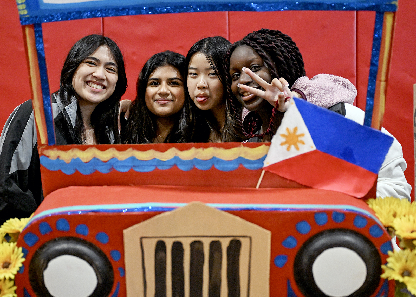 students smile at multicultural fair