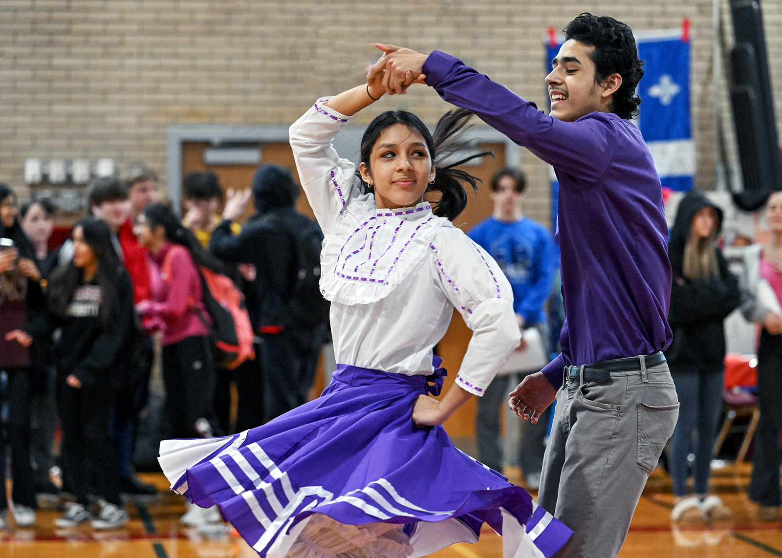 Two students dancing