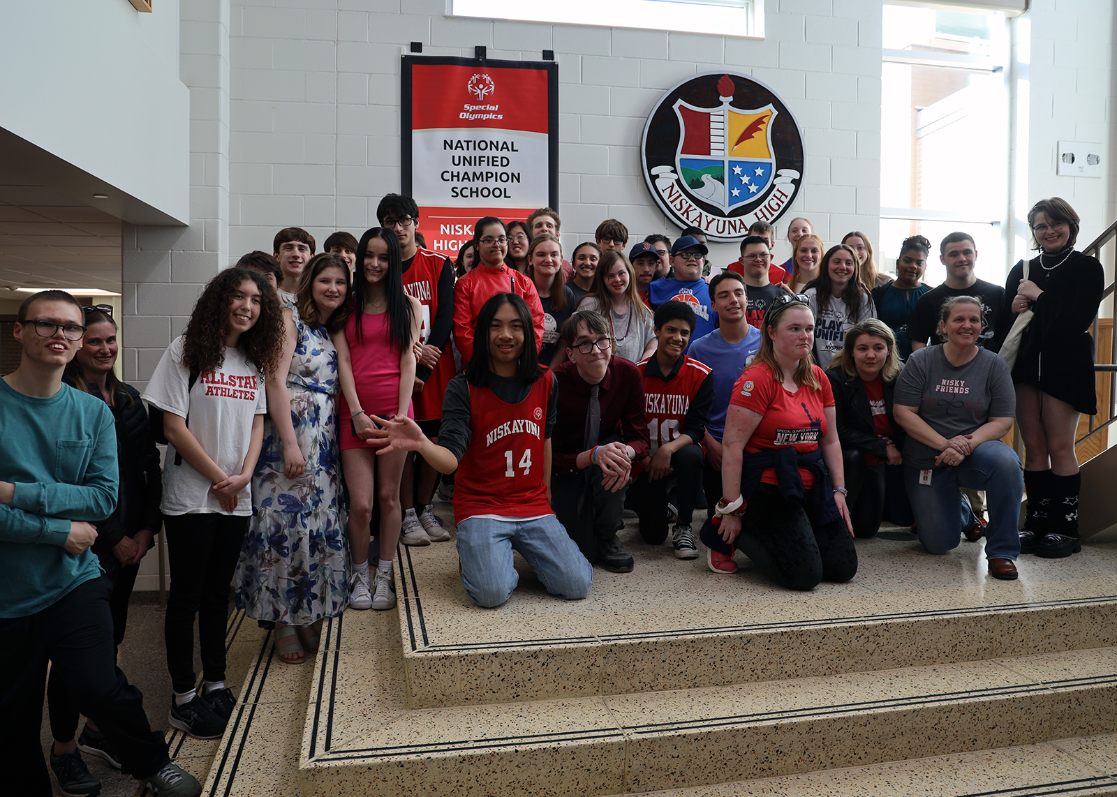 Nisky Unified Sports students smile with National Banner