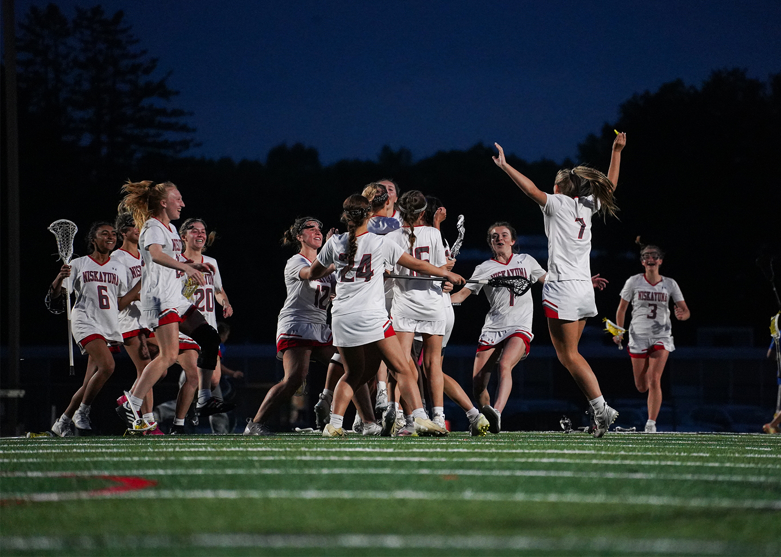 girls lacrosse team celebrates Section II title
