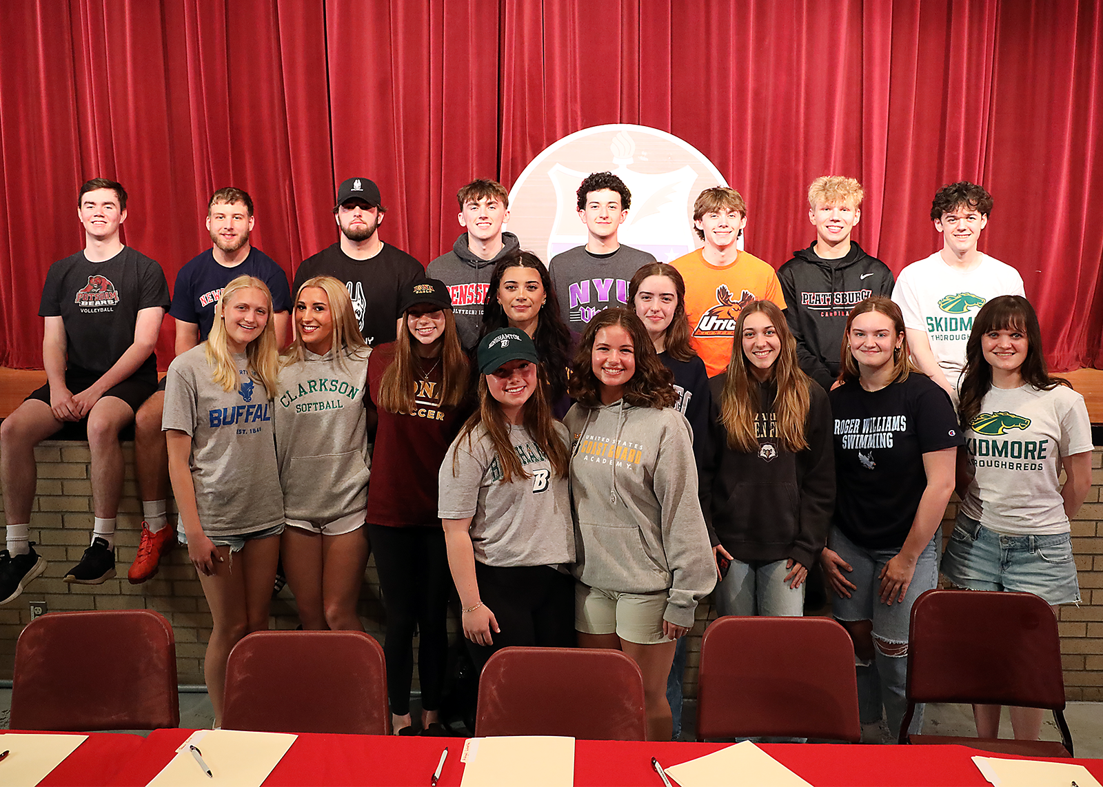 group of student athletes at signing day