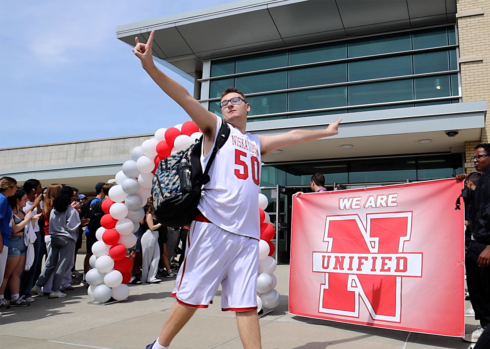 unified student celebrating send off to championship