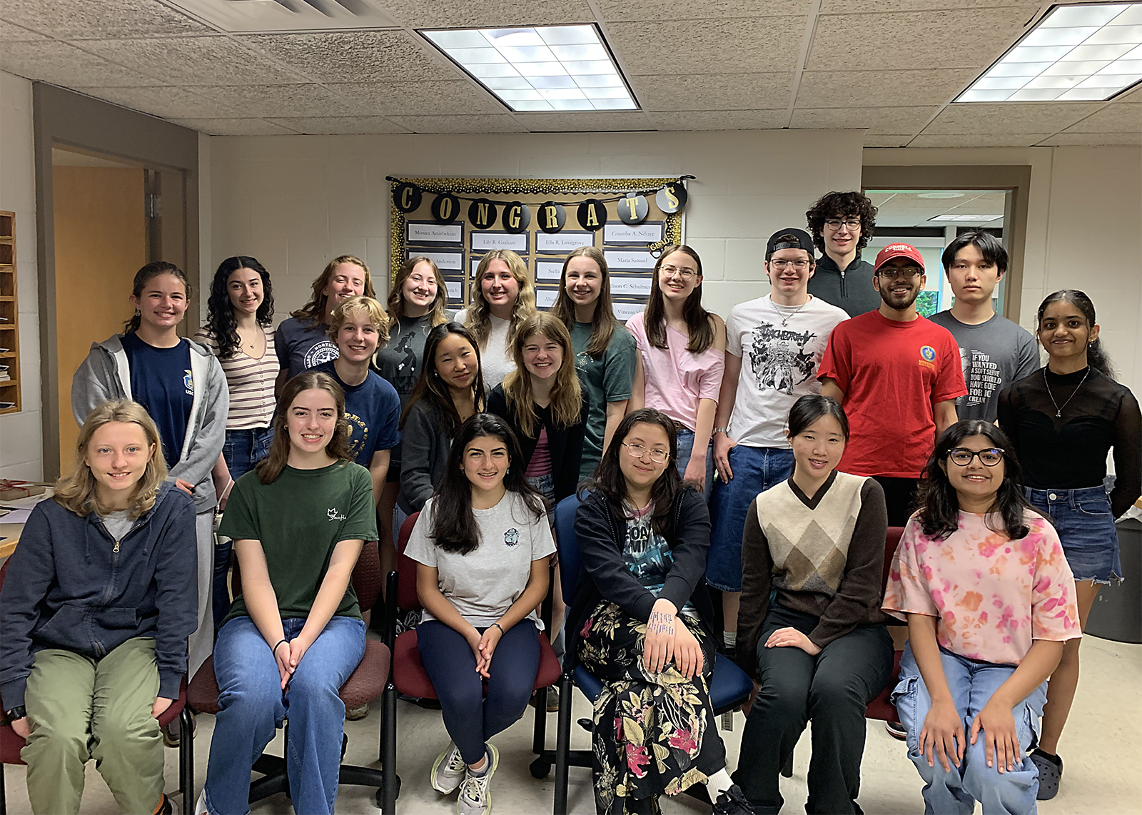 group of high school students smiling for camera