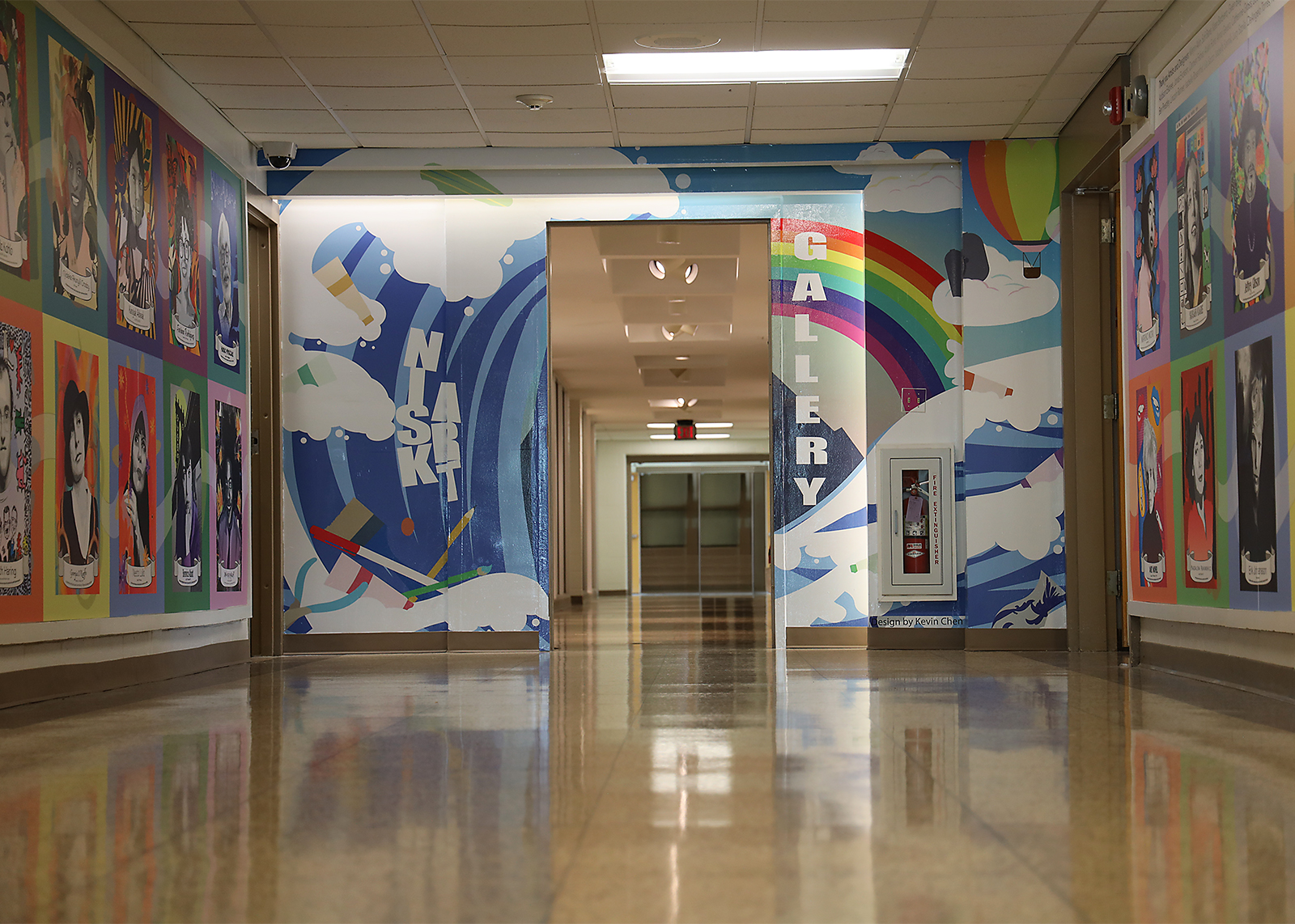 low angle shot of an art gallery entrance decorated by a mural