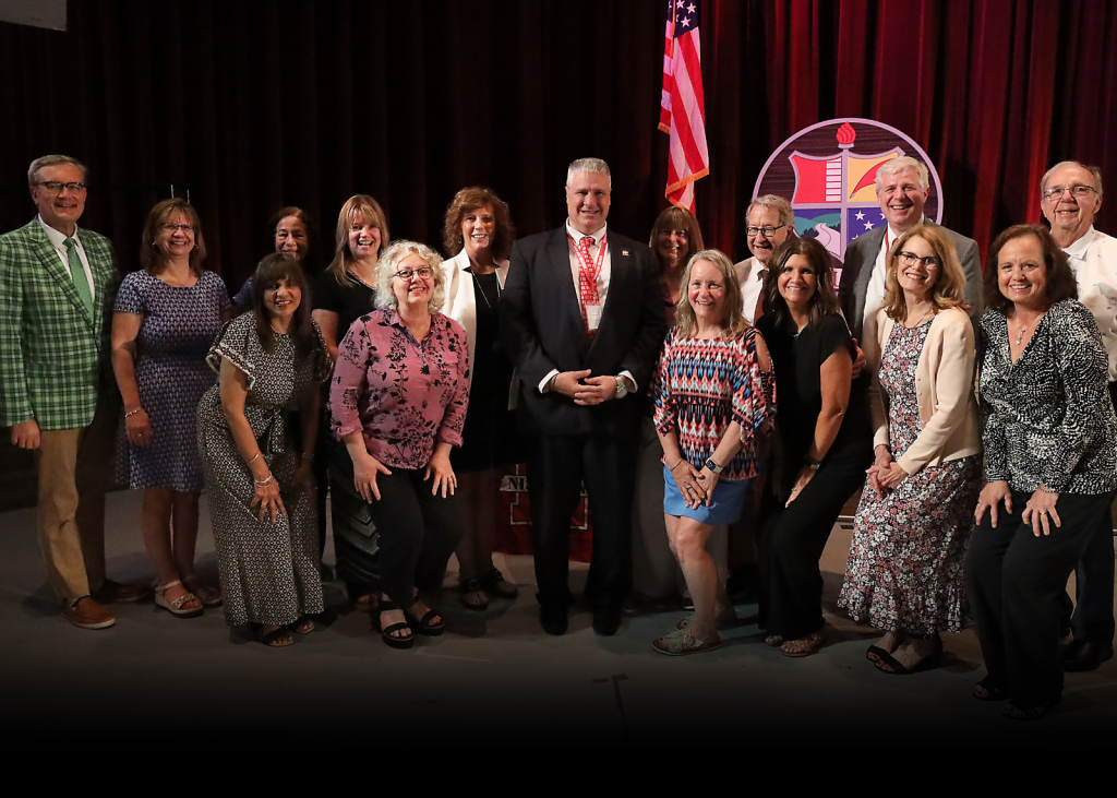 group of retirees smiling for camera