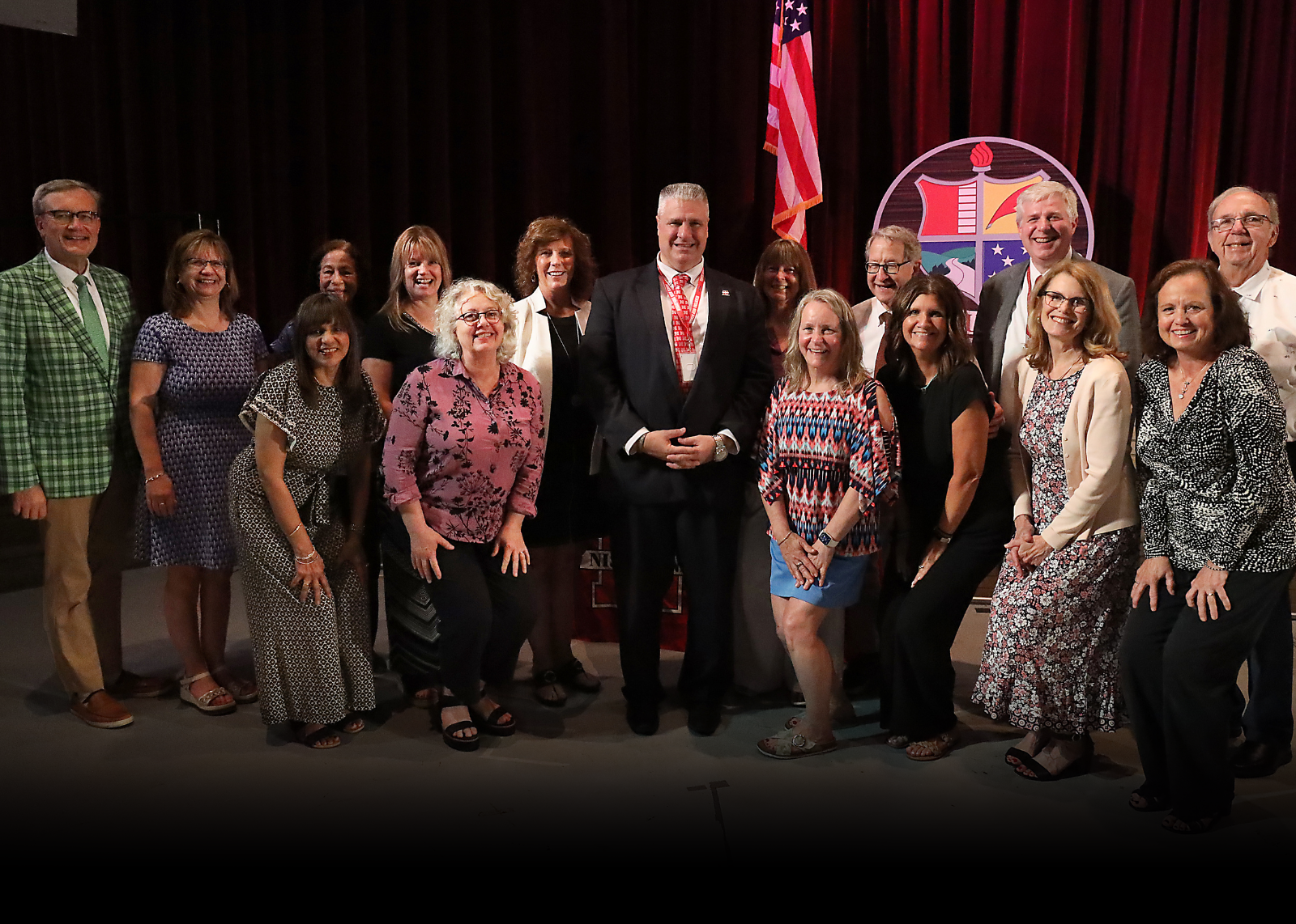group of retirees smiling for camera