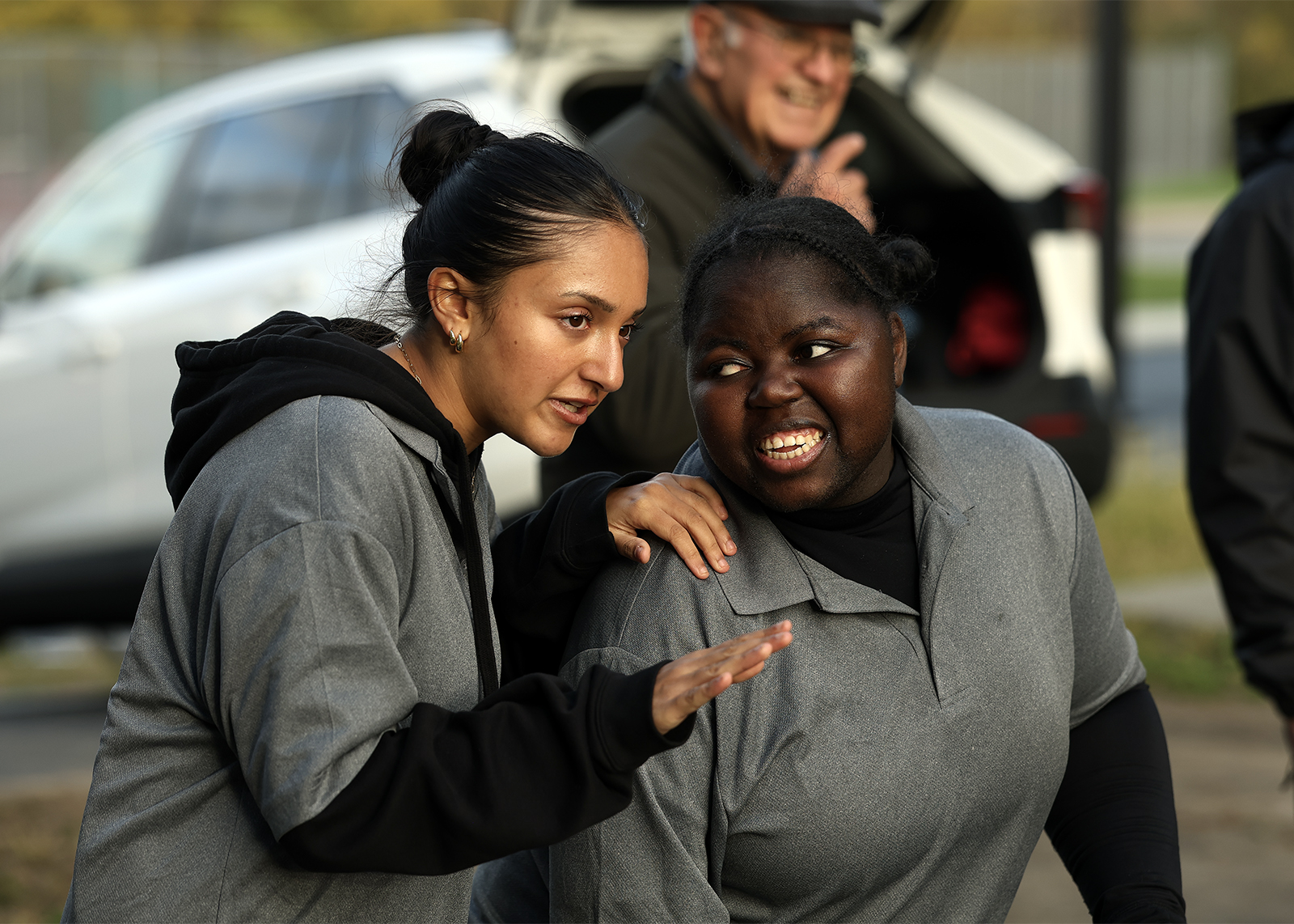 unified bocces athlete and partner strategize