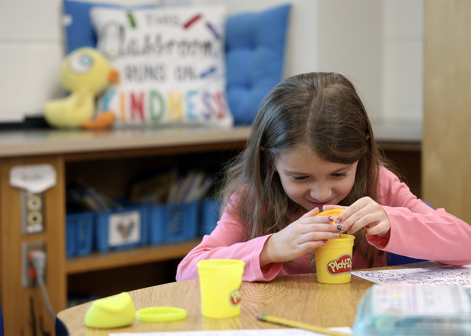 first graders playing with Play Doh
