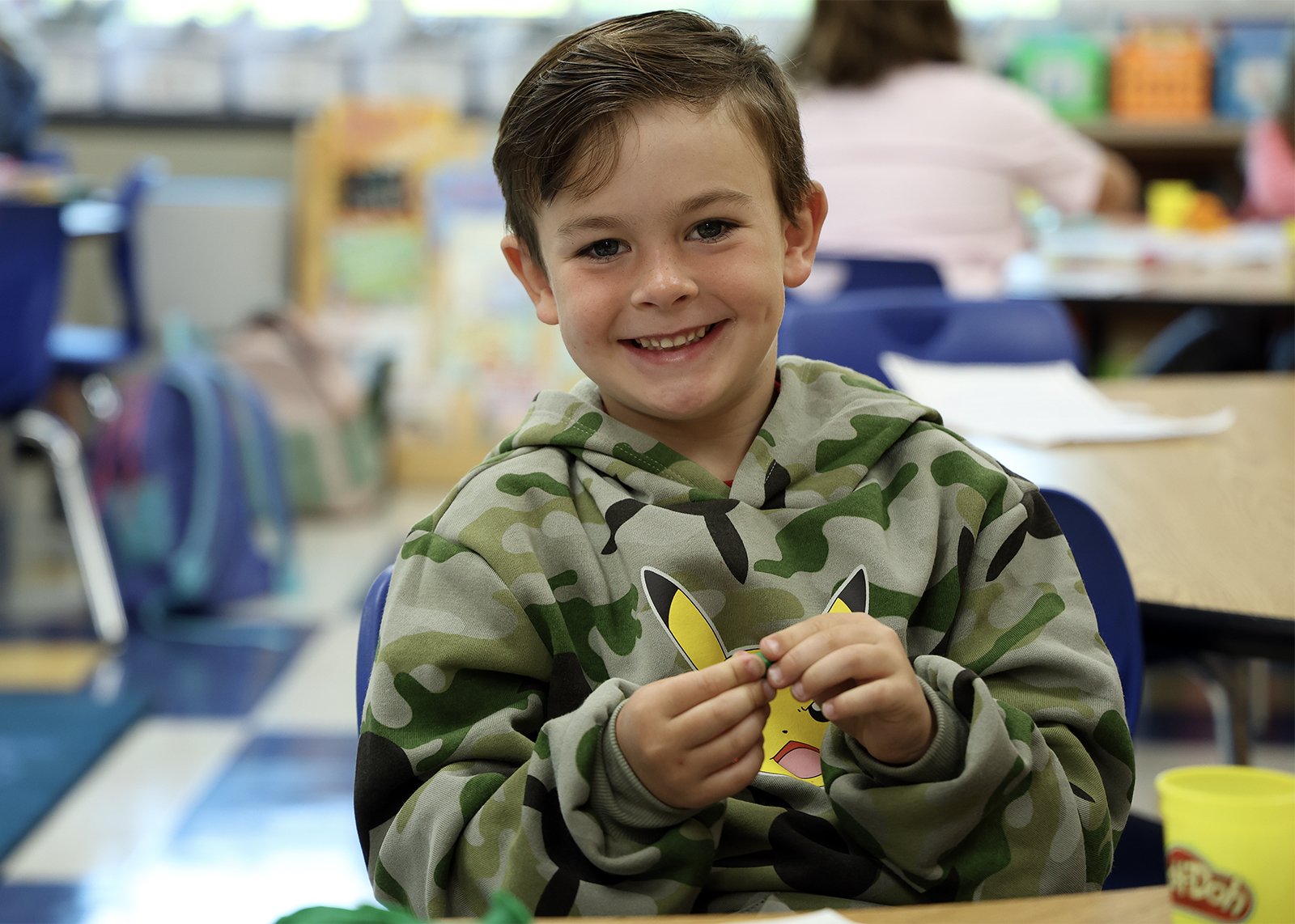elementary student smiling