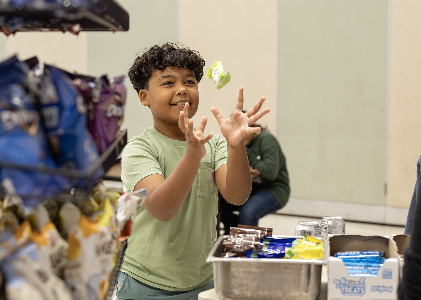 middle school student catching a snack