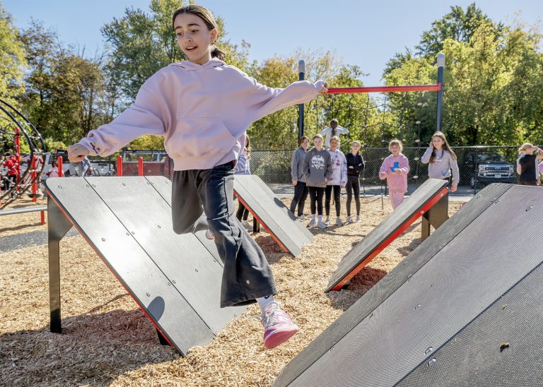 sixth grade students enjoys ninja course on new playground