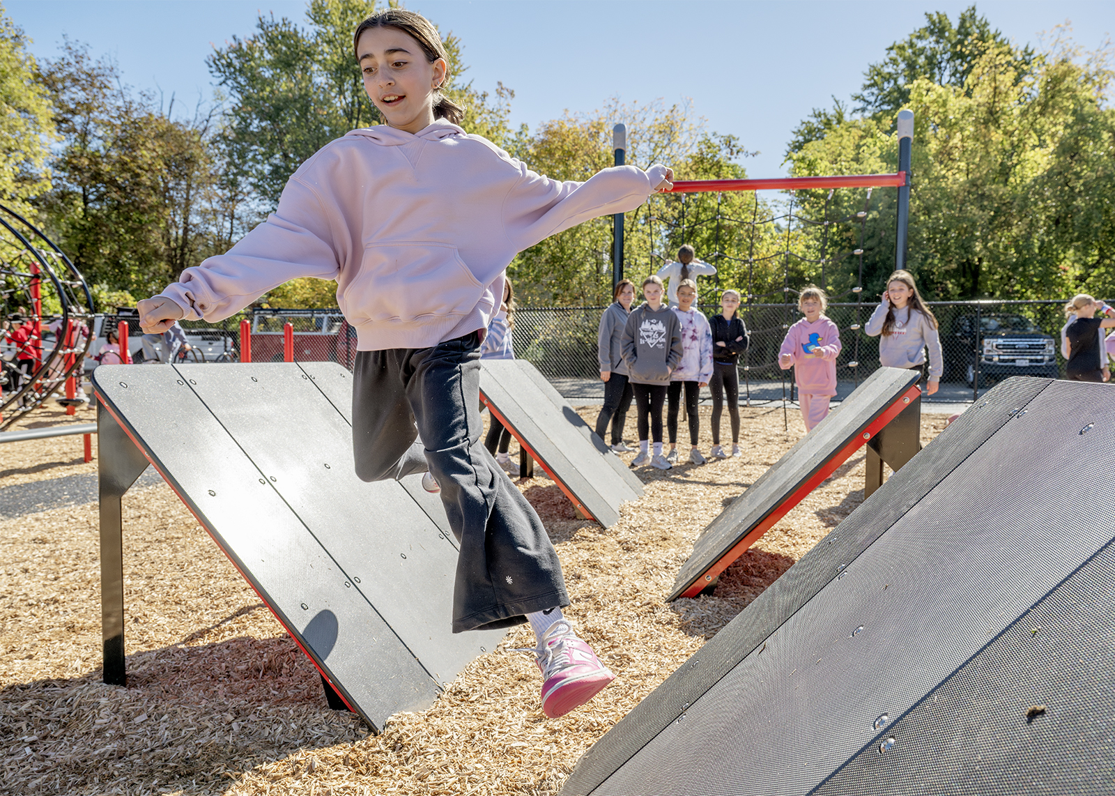 sixth grade students enjoys ninja course on new playground