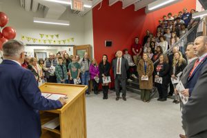 Superintendent Carl Mummenthey speaks to the group at the rededication.