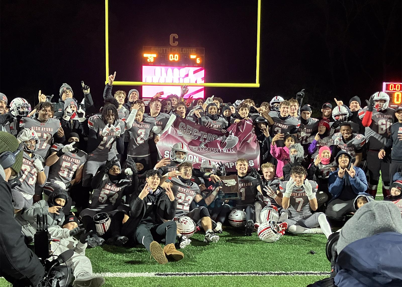 football teams celebrates sectional title