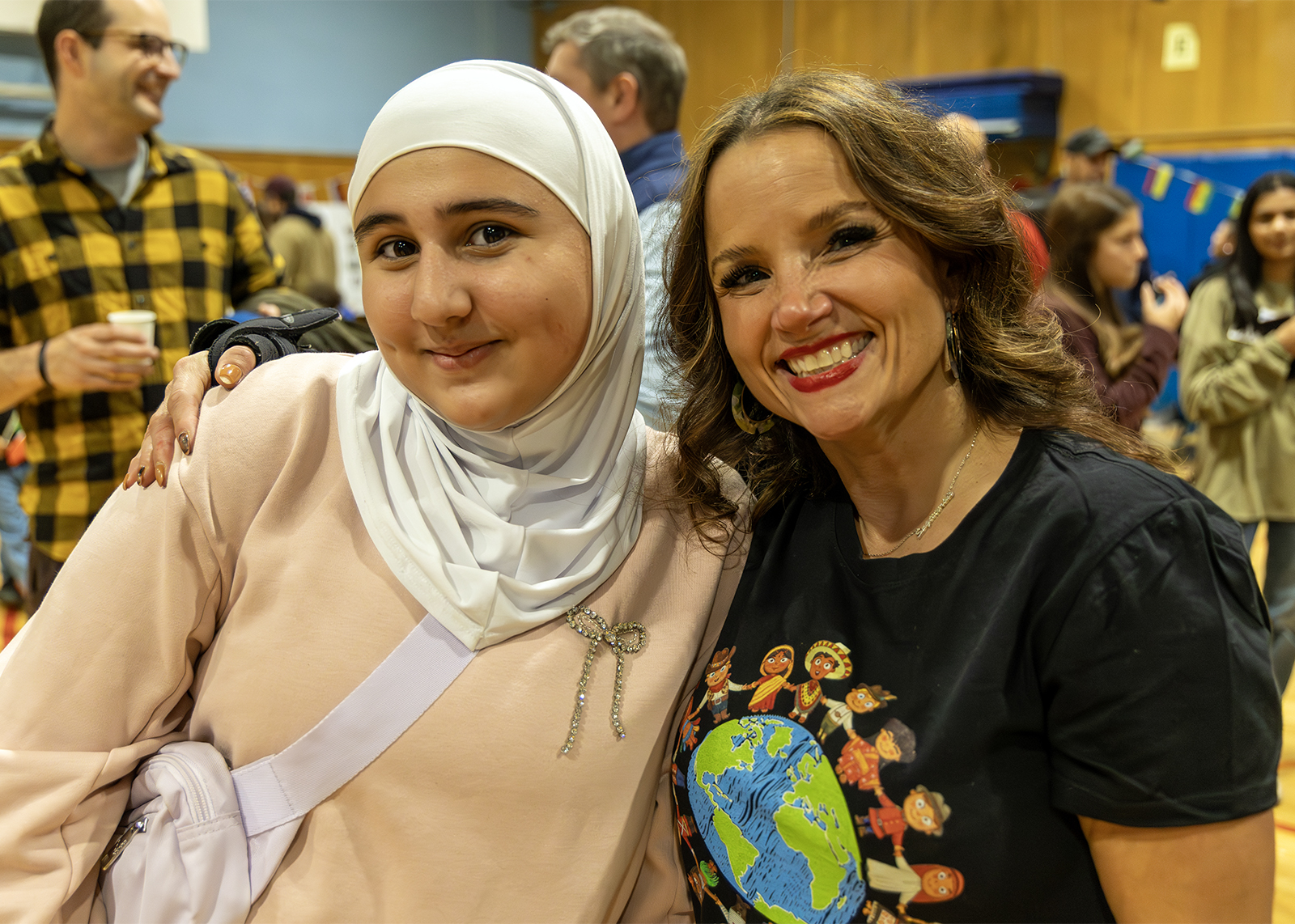 educator and student smile