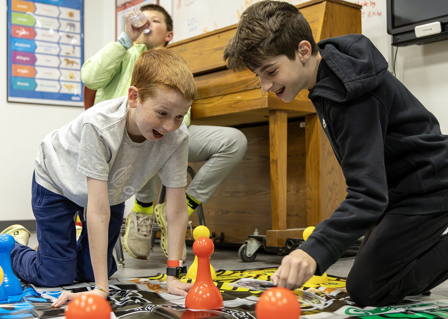 middle school student playing life size Sorry!
