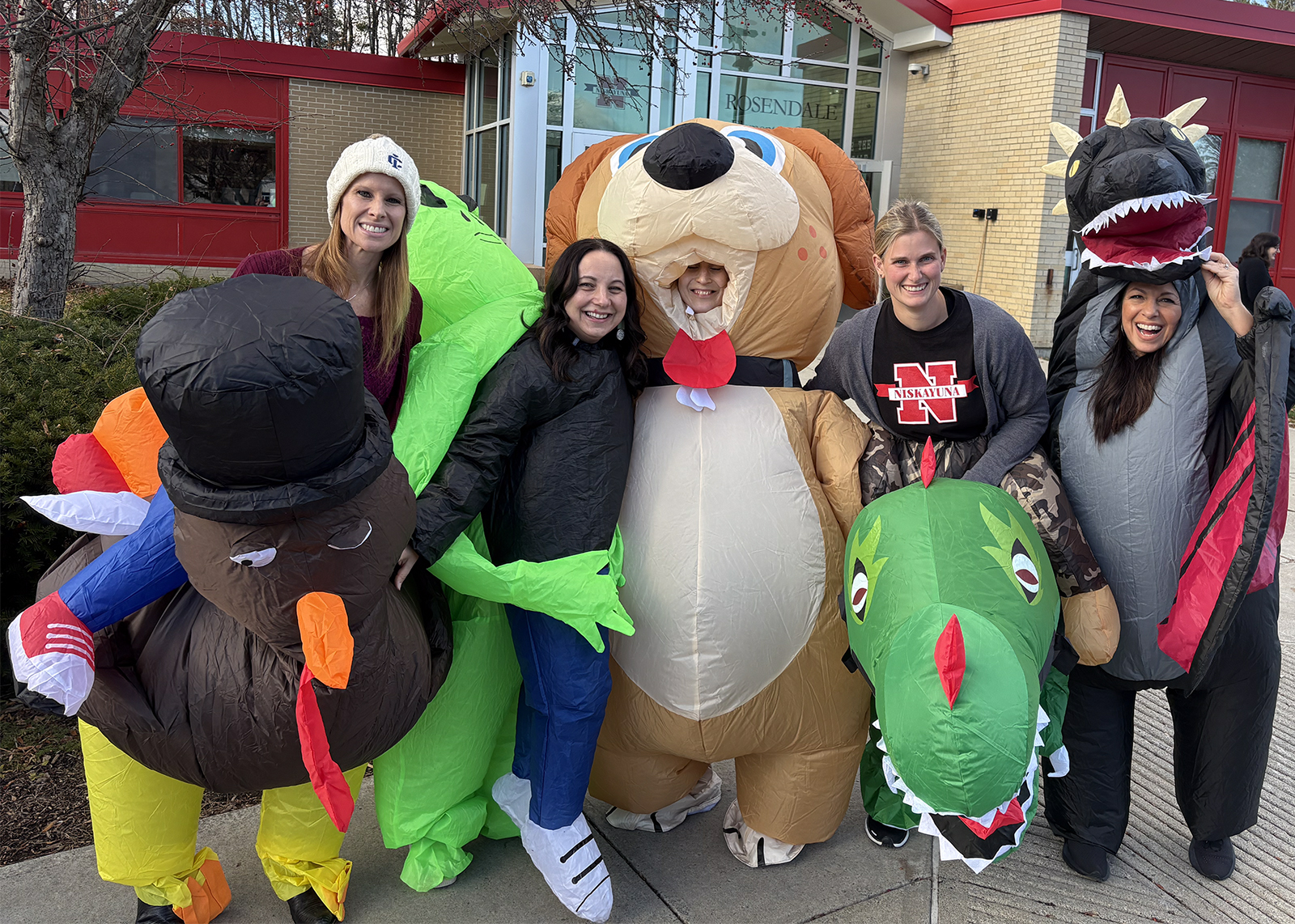 educators in inflatable costumes