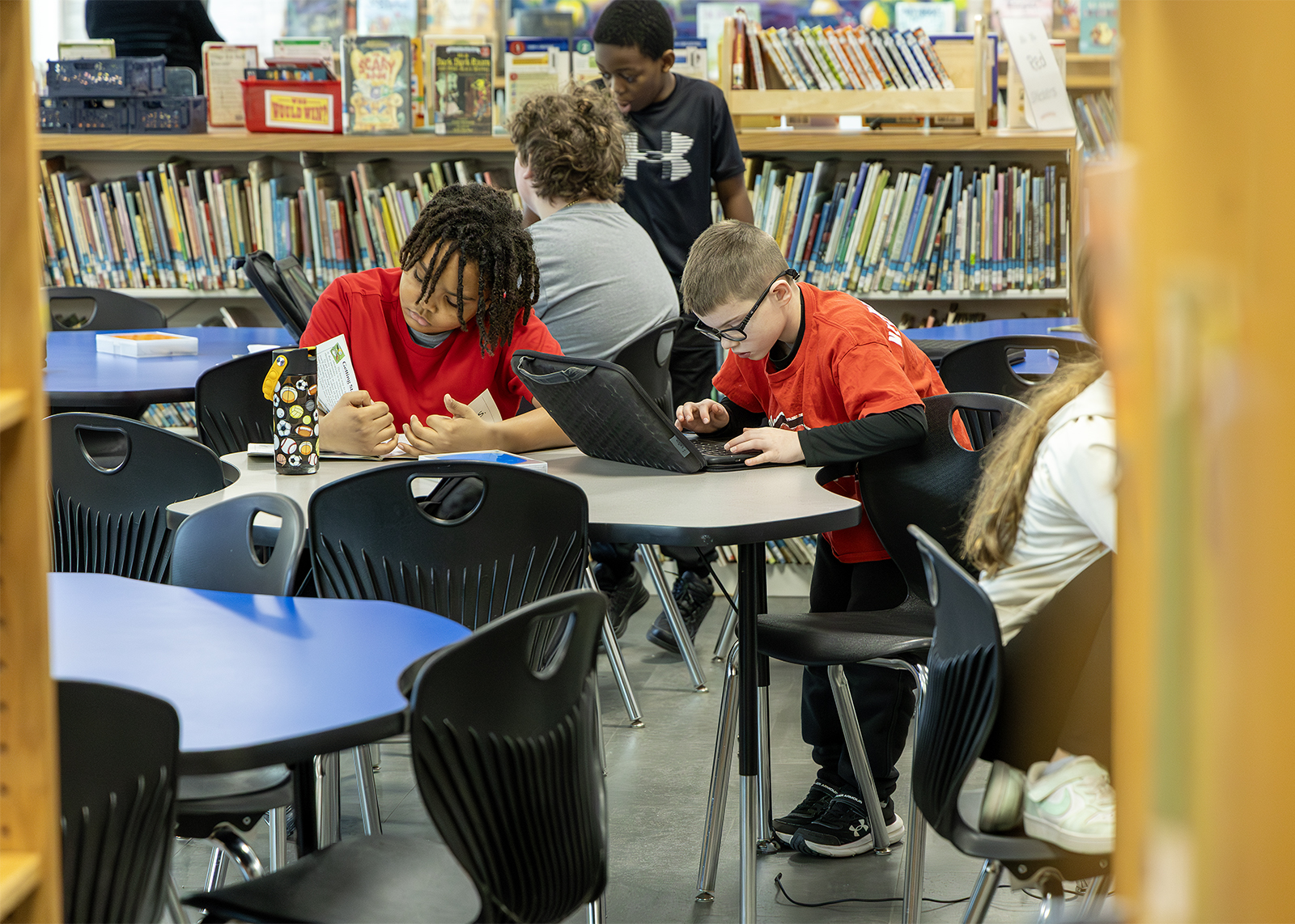 elementary students in library
