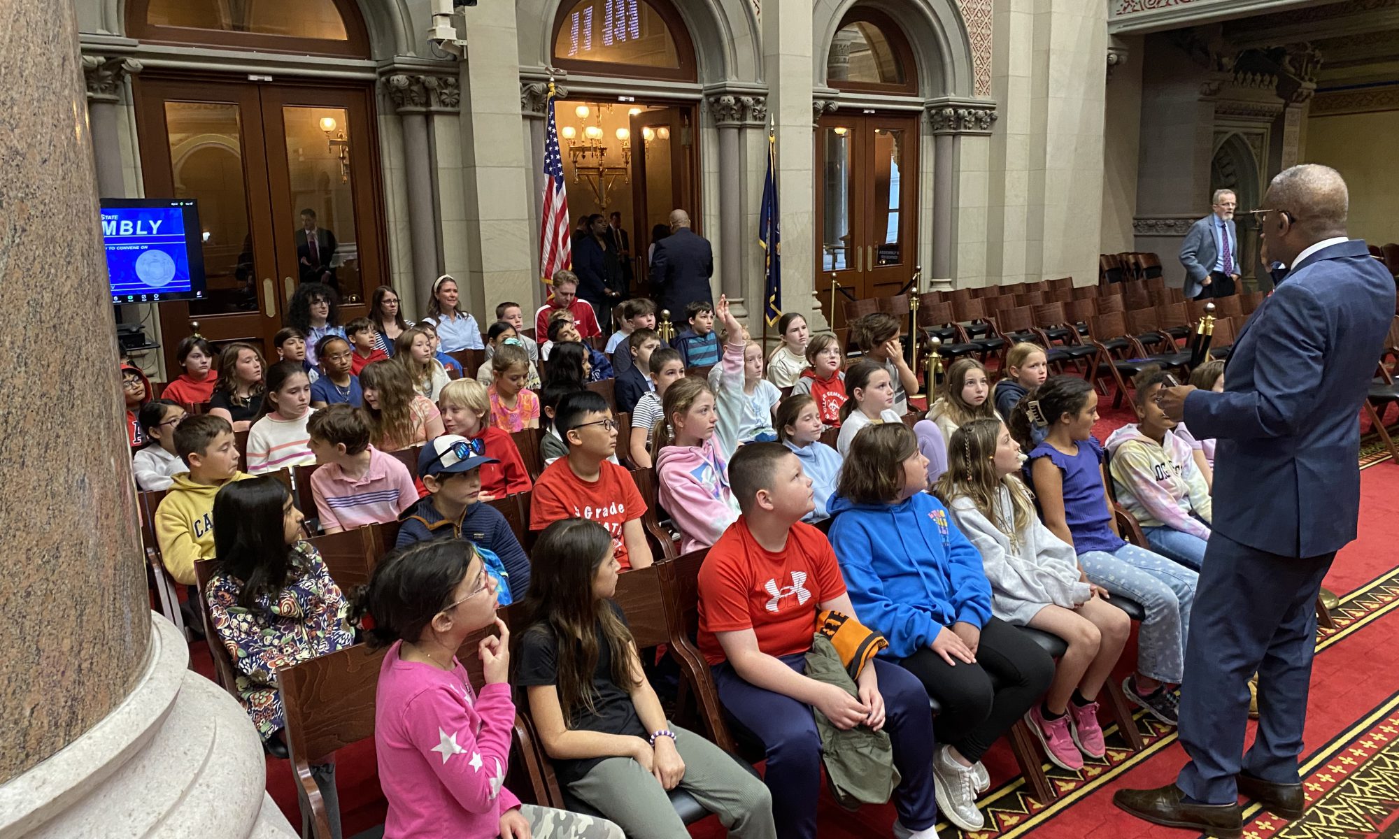 Fourth grade students at Hillside Elementary School engage with a presentation at the state capitol