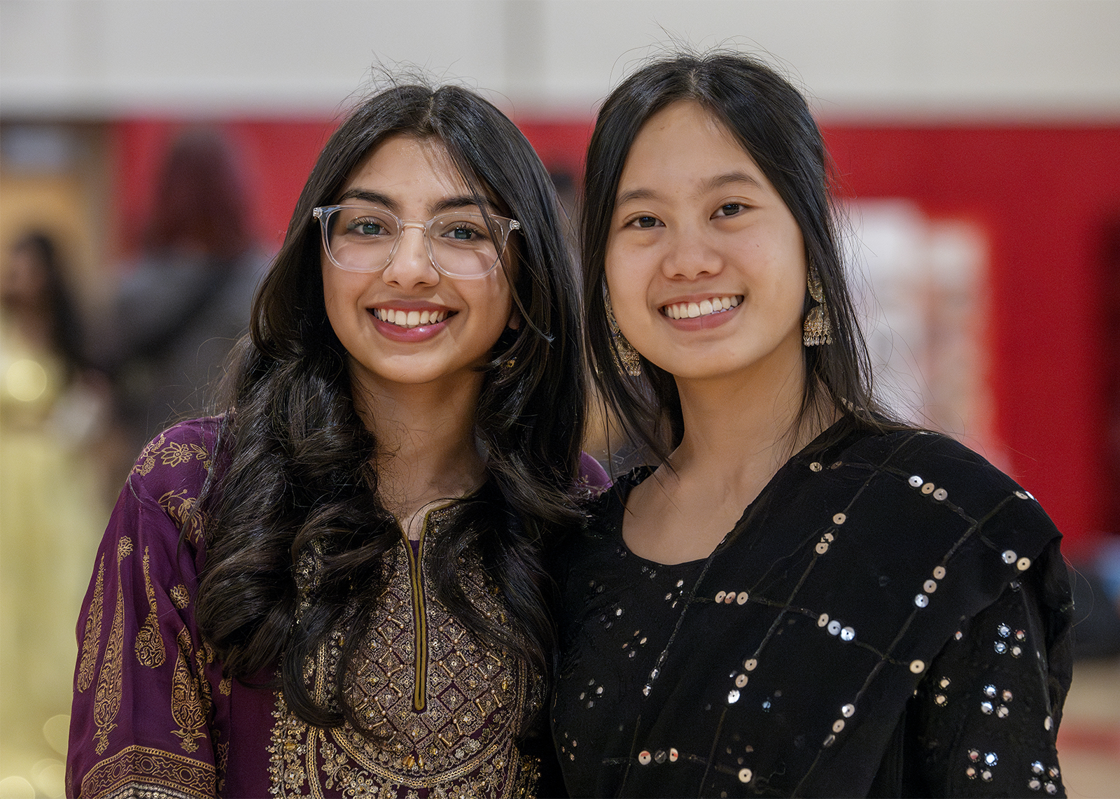 students smiling at the multicultural fair
