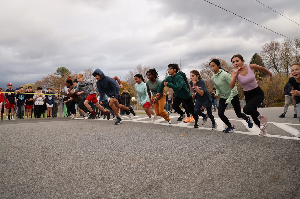 students running on track