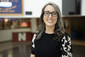 Professional photo of Danielle Vincent. She is smiling and in professional attire.