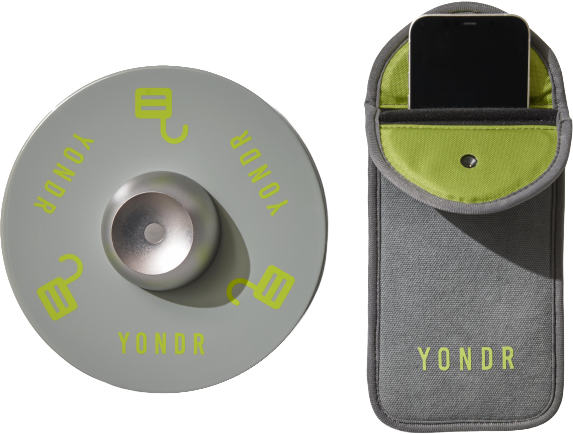 A Yondr pouch with a smartphone sticking out.