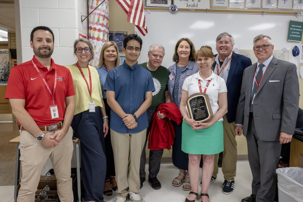 Elizabeth Kenny holding her award with a student, district admin and Niskayuna Community Foundation reps.