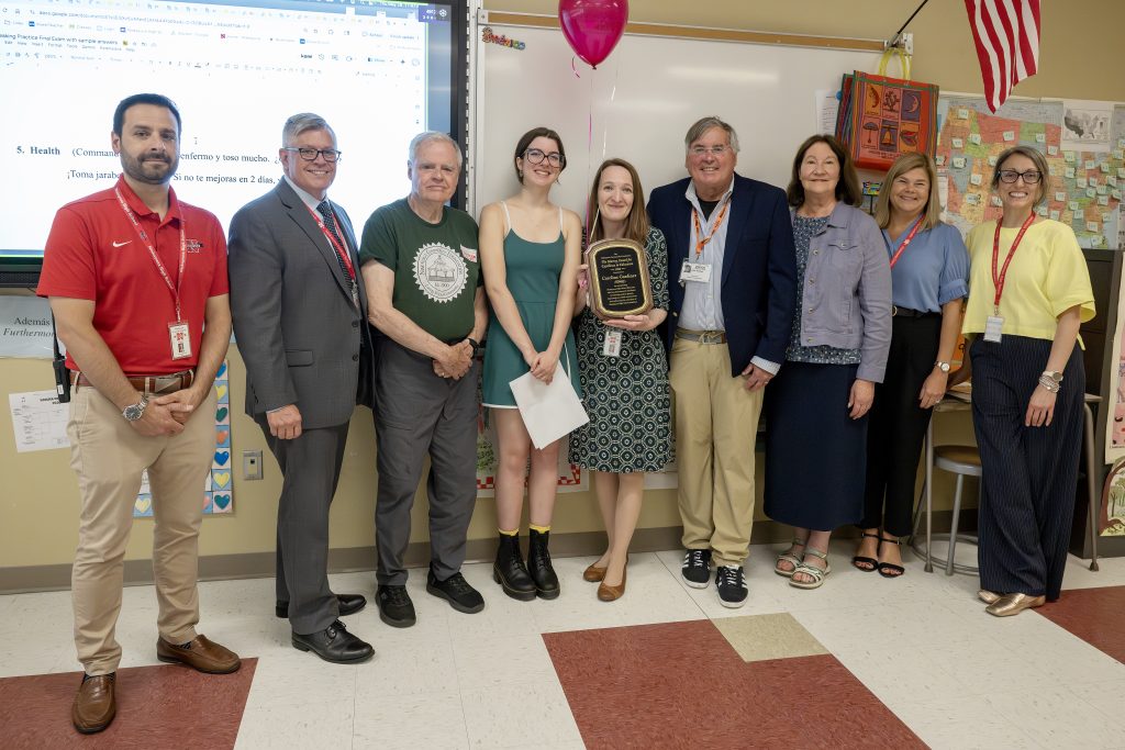 Caroline Gardner holding her award with a student, district admin and Niskayuna Community Foundation reps.