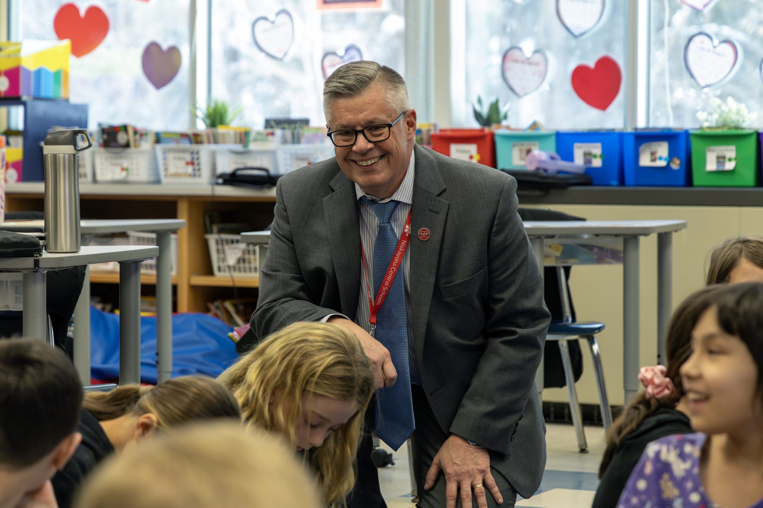 Superintendent Carl Mummenthey with students at Birchwood Elementary School
