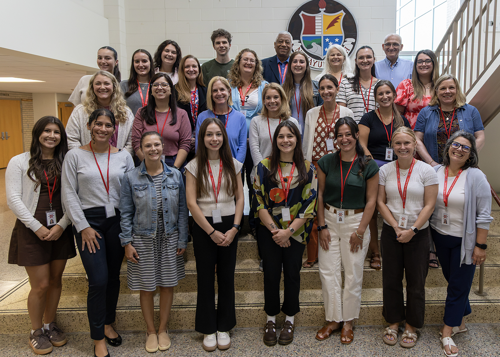 a group of new teachers posing for a photo