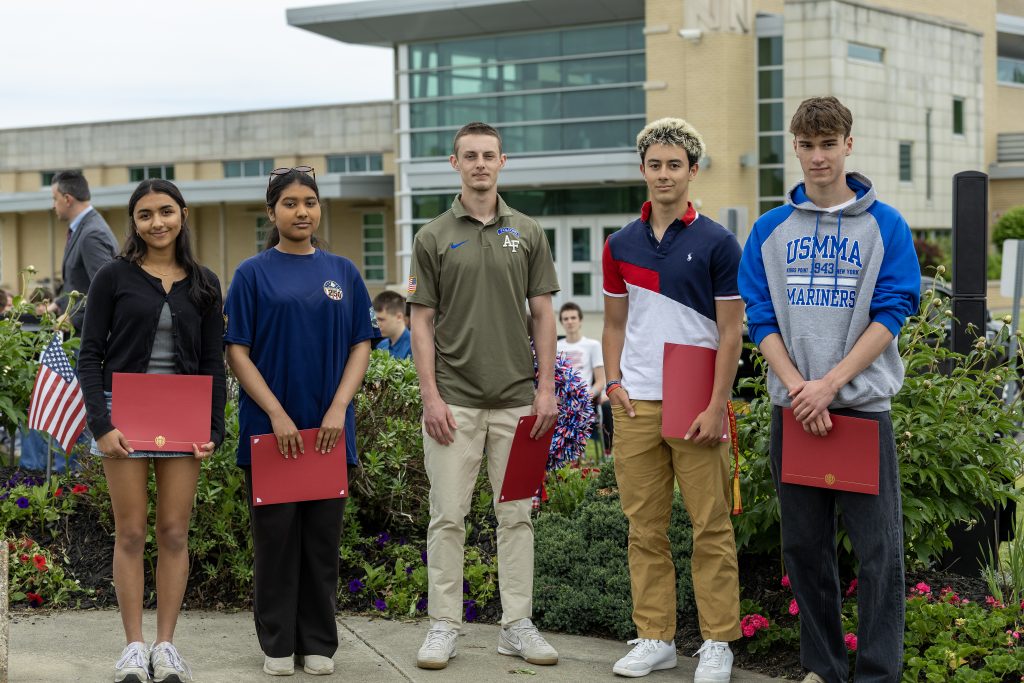 Five Niskayuna High School students posed with certificates